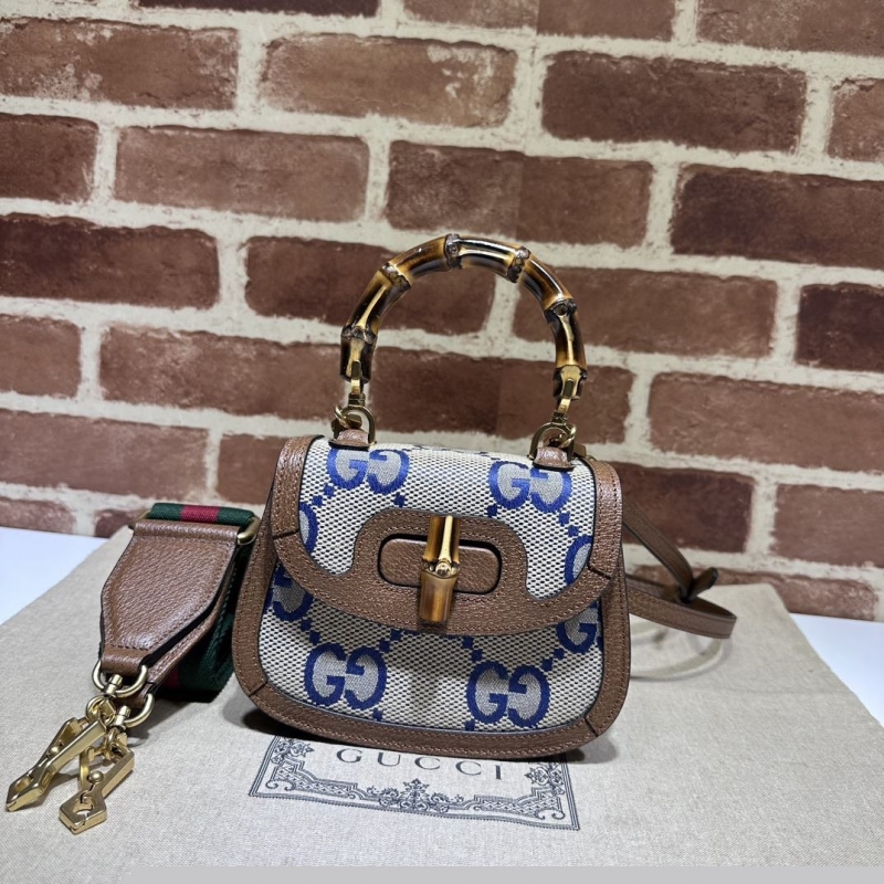 G*u*i top handle bags